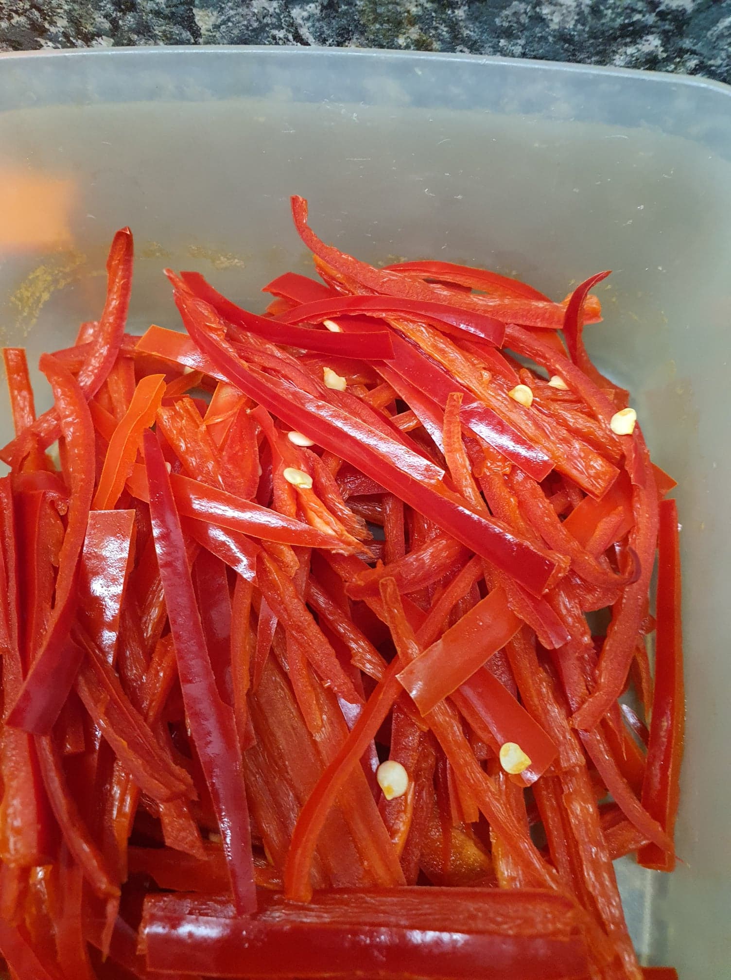 Fresh sliced red chillies in a bowl